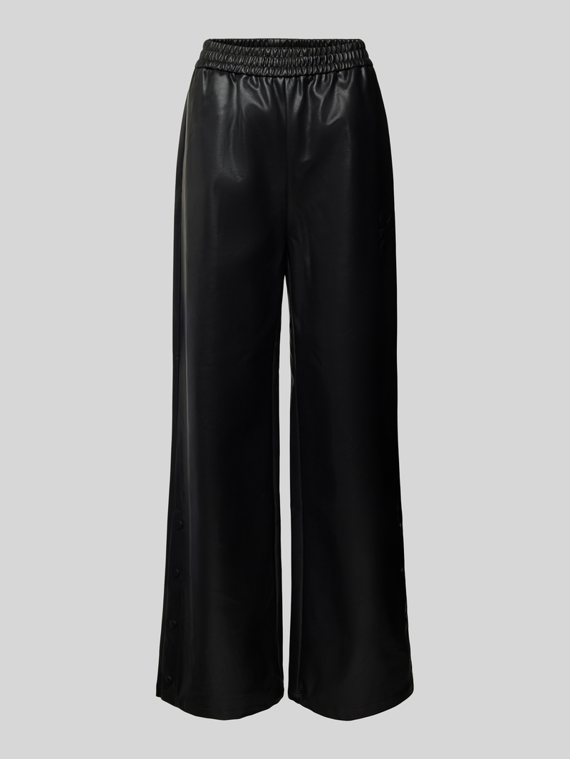 Spodnie typu track pants o kroju baggy fit z imitacji skóry