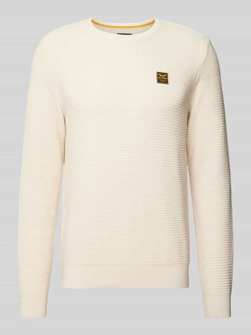 Sweter z dzianiny z naszywką z logo