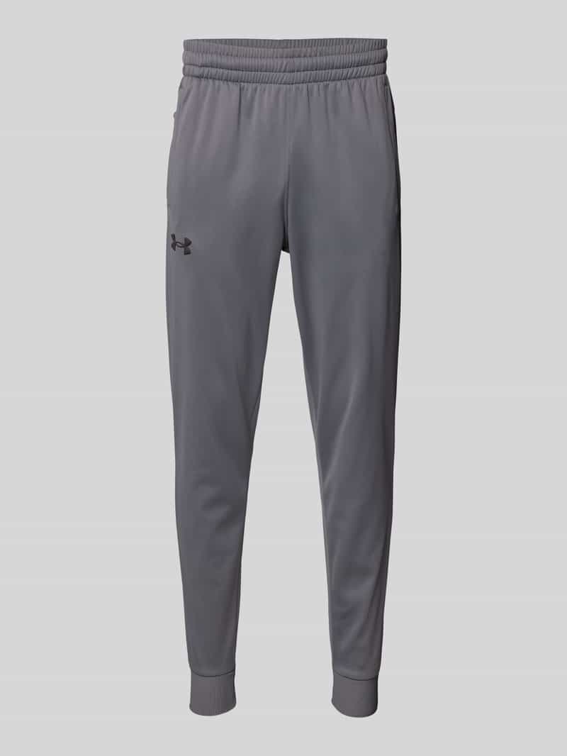 Spodnie dresowe o kroju slim fit z nadrukiem z logo