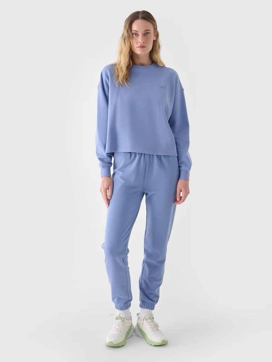 Spodnie dresowe joggery damskie 4F 4FWAW24TTROF0925-32S Niebieski