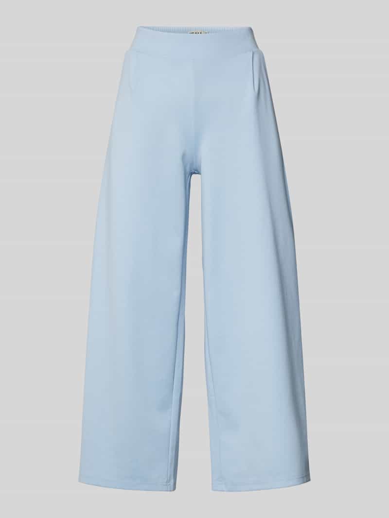 Spodnie materiałowe z wpuszczaną kieszenią