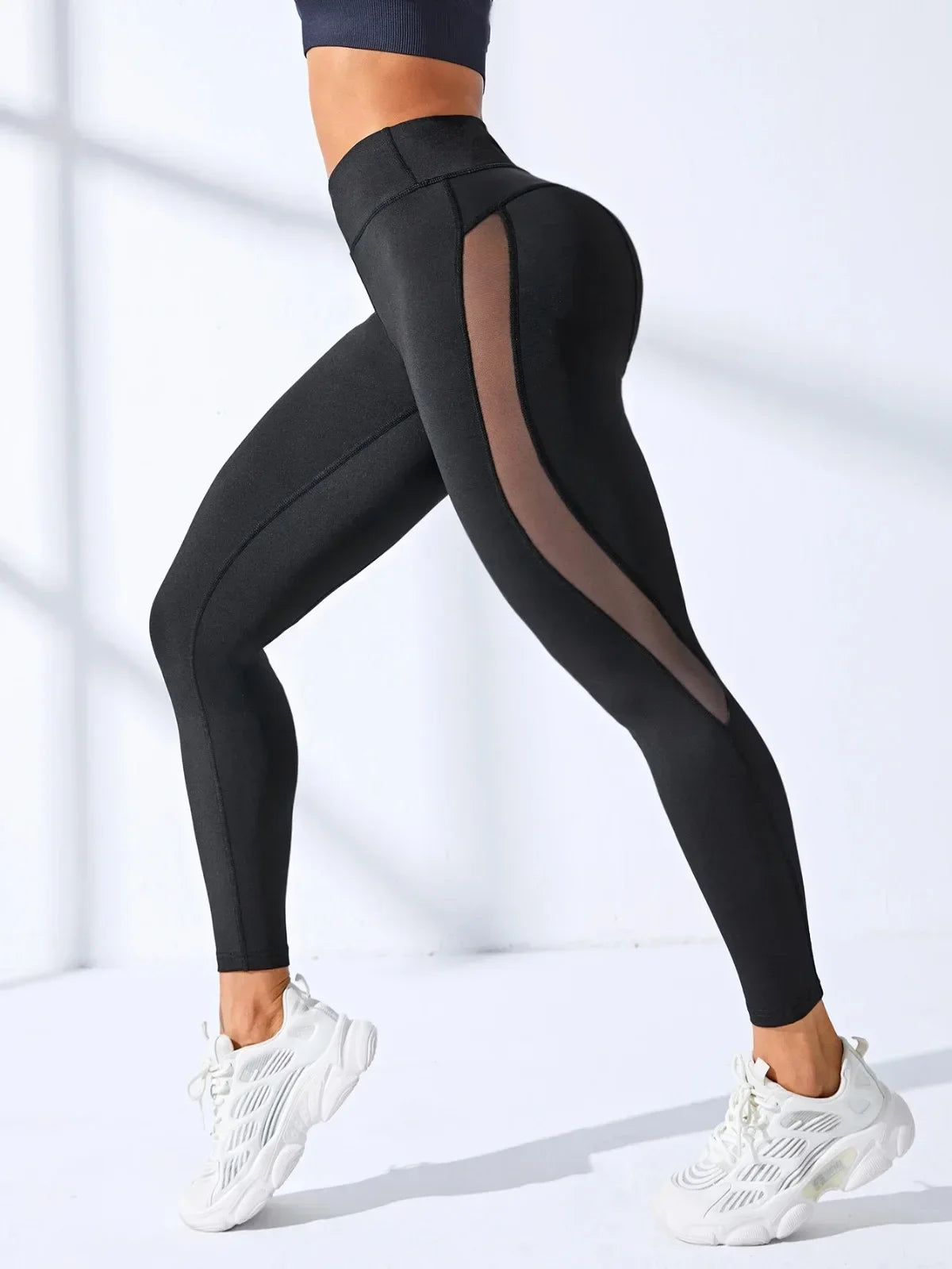 Sportowe legginsy damskie - Czarny