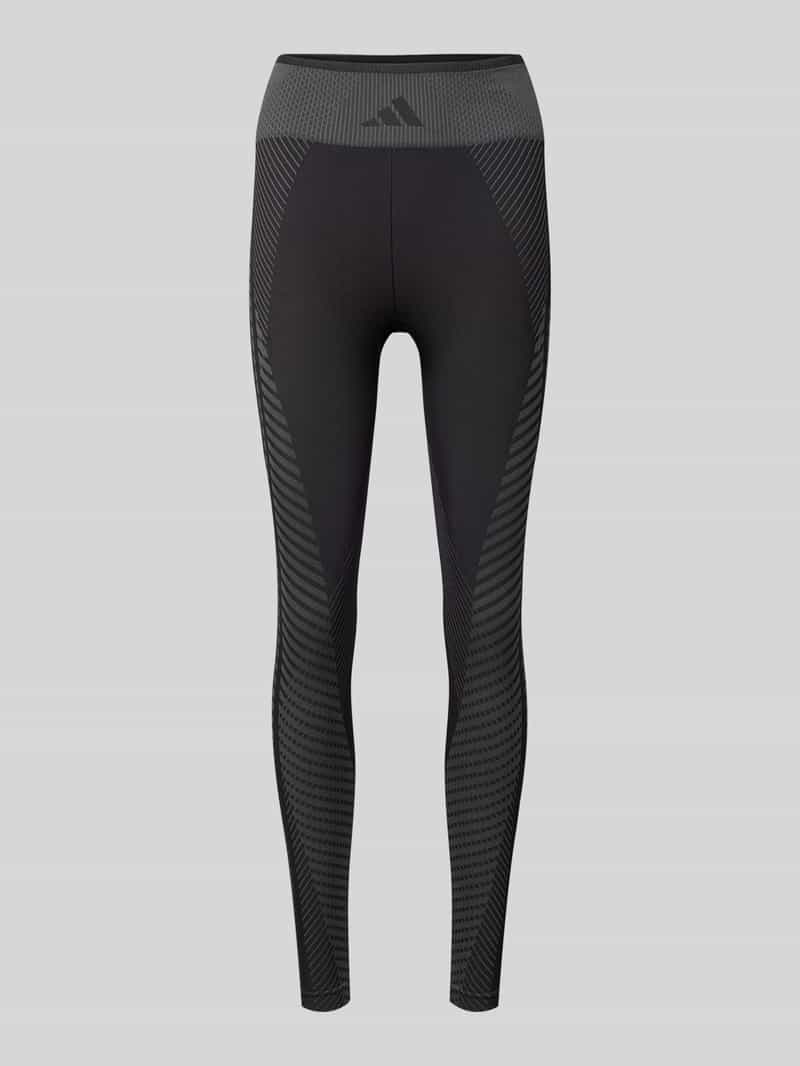 Legginsy o kroju super skinny fit z wyhaftowanym logo