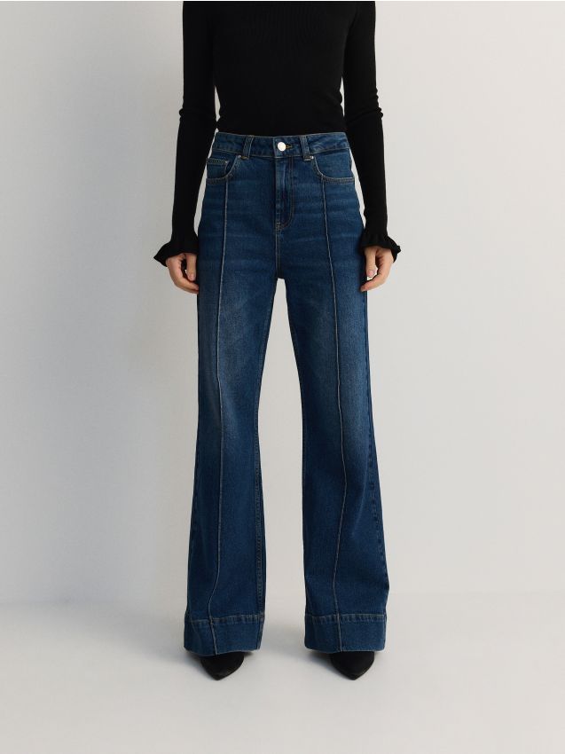 Reserved - Jeansy z haftem z tyłu - granatowy