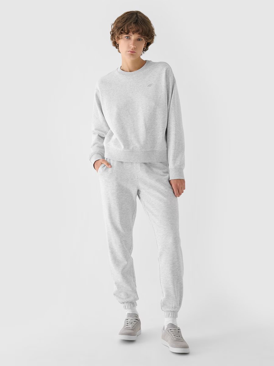 Spodnie dresowe joggery damskie 4F 4FWMM00TTROF1137-27M Szary