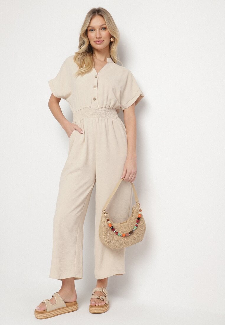 Beżowy Kombinezon z Wiskozy z Gumką w Talii i Dekoltem w Serek z Guzikami Nisella
