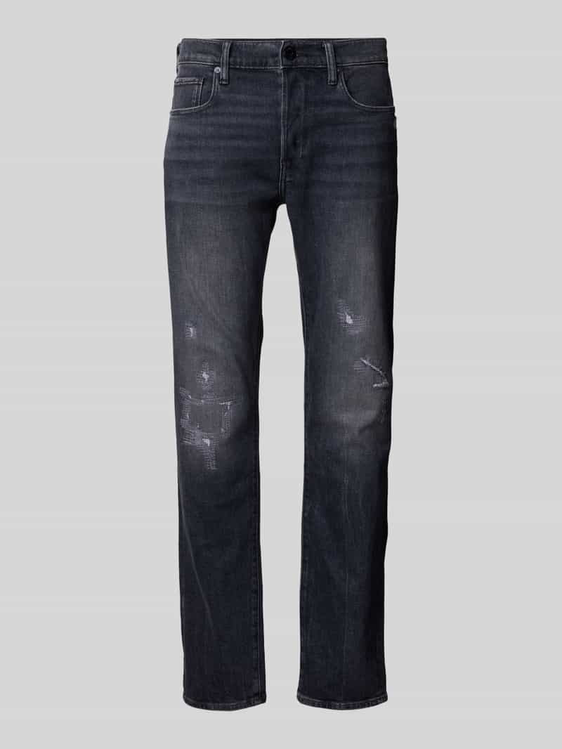 Jeansy o kroju slim fit z przetarciami
