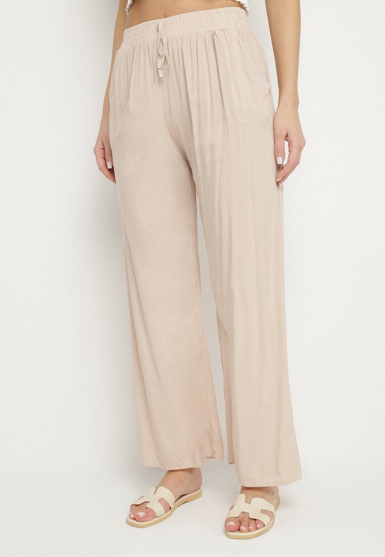 Beżowe Wiskozowe Szerokie Spodnie z Wysokim Stanem Ozdobione Wiązaniem Lisozi