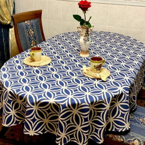 Owalny bawełniany obrus plamoodporny z wzorem Kręgi granatowy