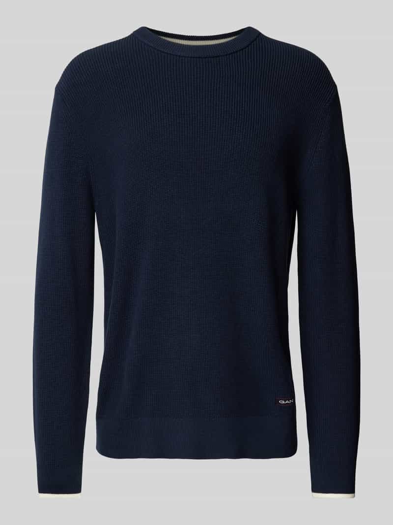 Sweter z dzianiny z naszywką z logo