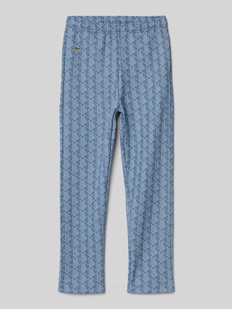 Spodnie dresowe o kroju regular fit z naszwyką z logo