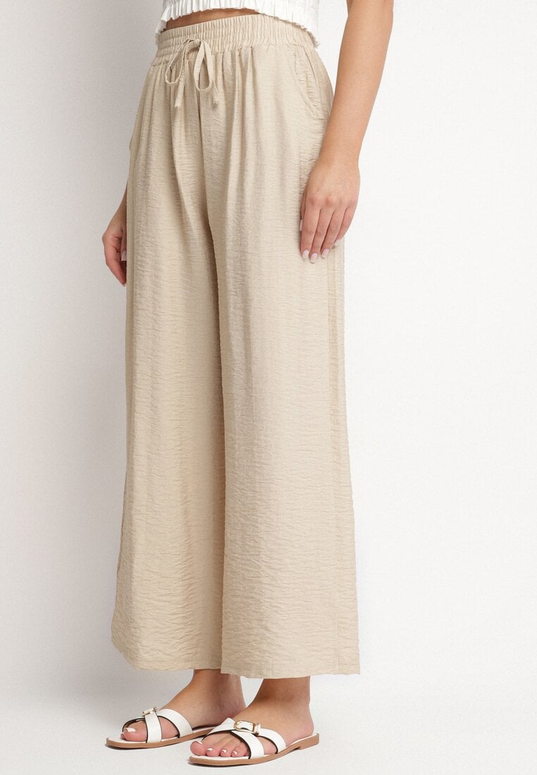 Beżowe Spodnie z Wiskozy z Wysokim Stanem Gumką w Pasie i Szeroką Nogawką Lannola
