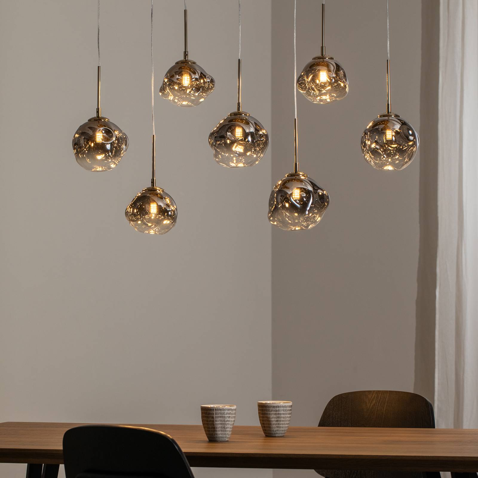 Lucea Lampa wisząca Herman, 7-punktowa, kolor złoty, długość 97 cm, szkło
