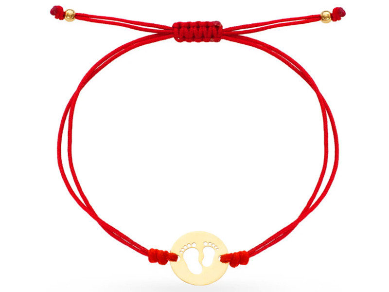 Złota bransoletka sznurkowa 585 stópki w kółeczku na czerwonym sznurku