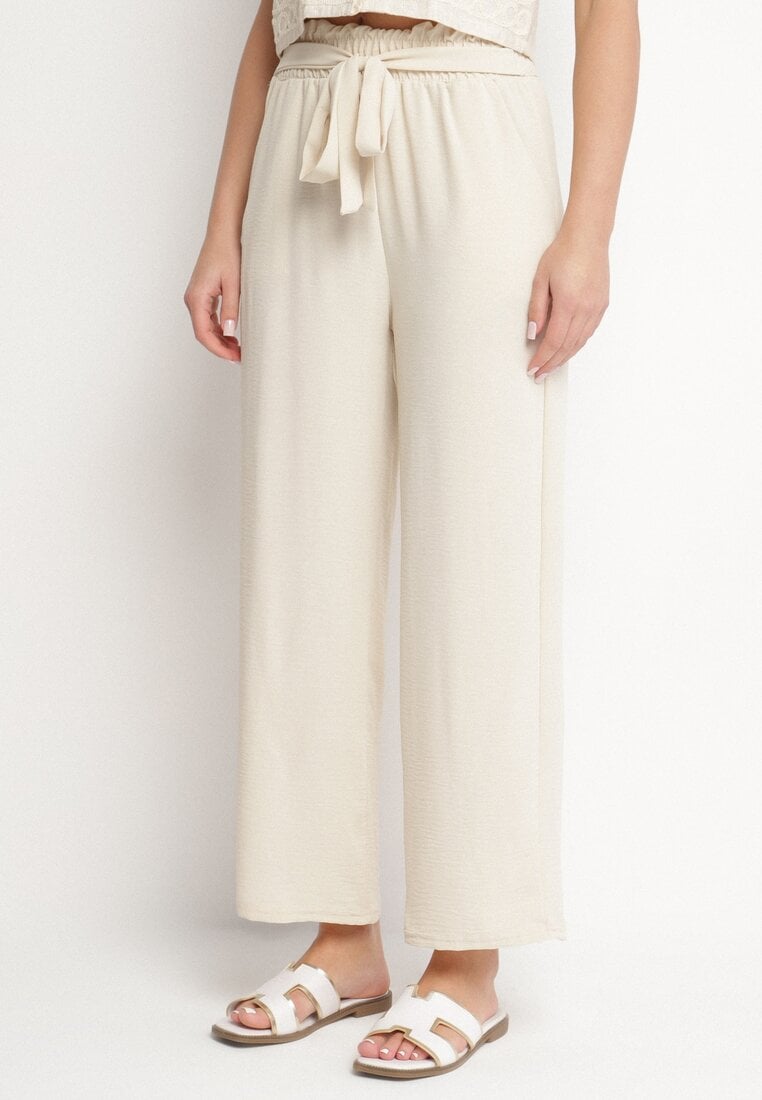 Beżowe Szerokie Spodnie z Wiskozą i Wysokim Stanem Ozdobione Wiązaniem Selwia