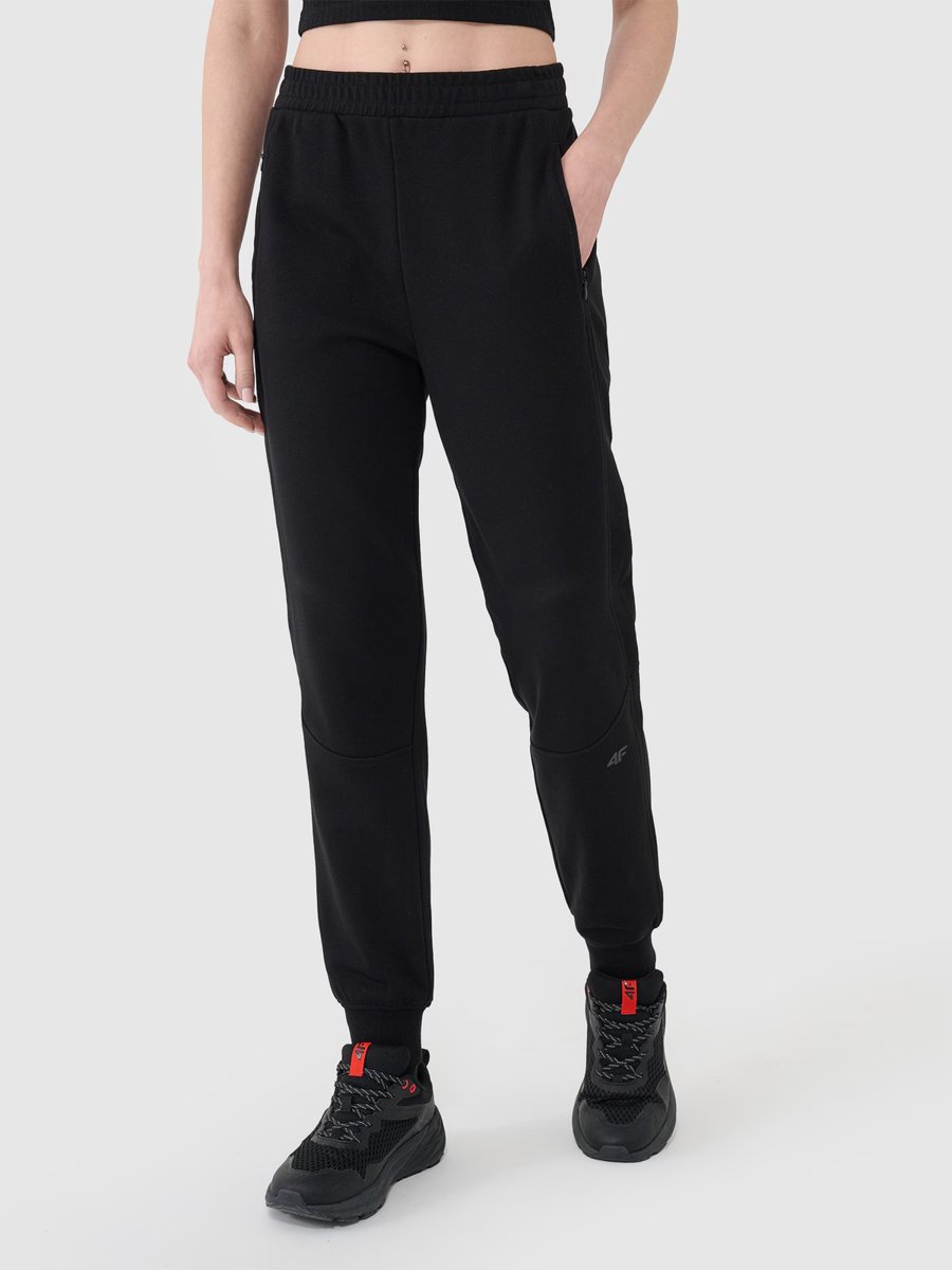 4F Spodnie damskie dresowe joggery 4FRSS25TTROF1398-20S Czarny Roz. XS