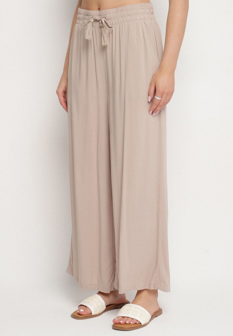Beżowe Wiskozowe Spodnie o Szerokim Kroju Ozdobione Sznurkiem Natamia