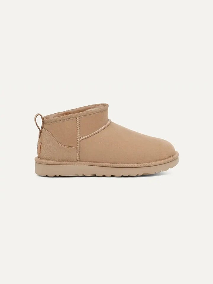 UGG Skórzane botki w kolorze beżowym