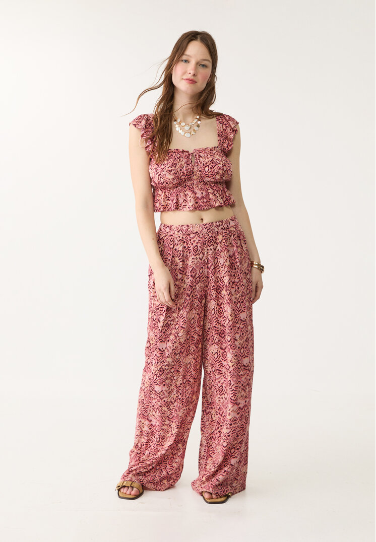 Stradivarius Luźny wzorzysty top z falbanami Cielisty róż XL