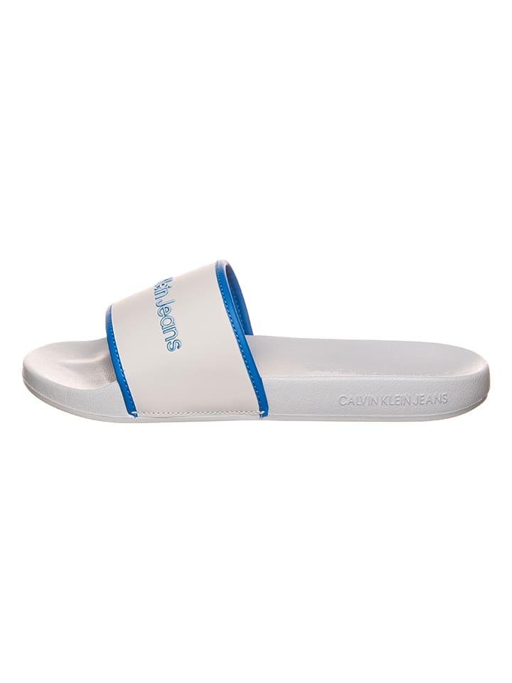 Calvin Klein Klapki w kolorze niebiesko-białym