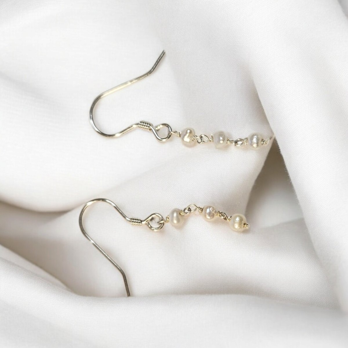 Srebrne kolczyki z naturalnymi perłami