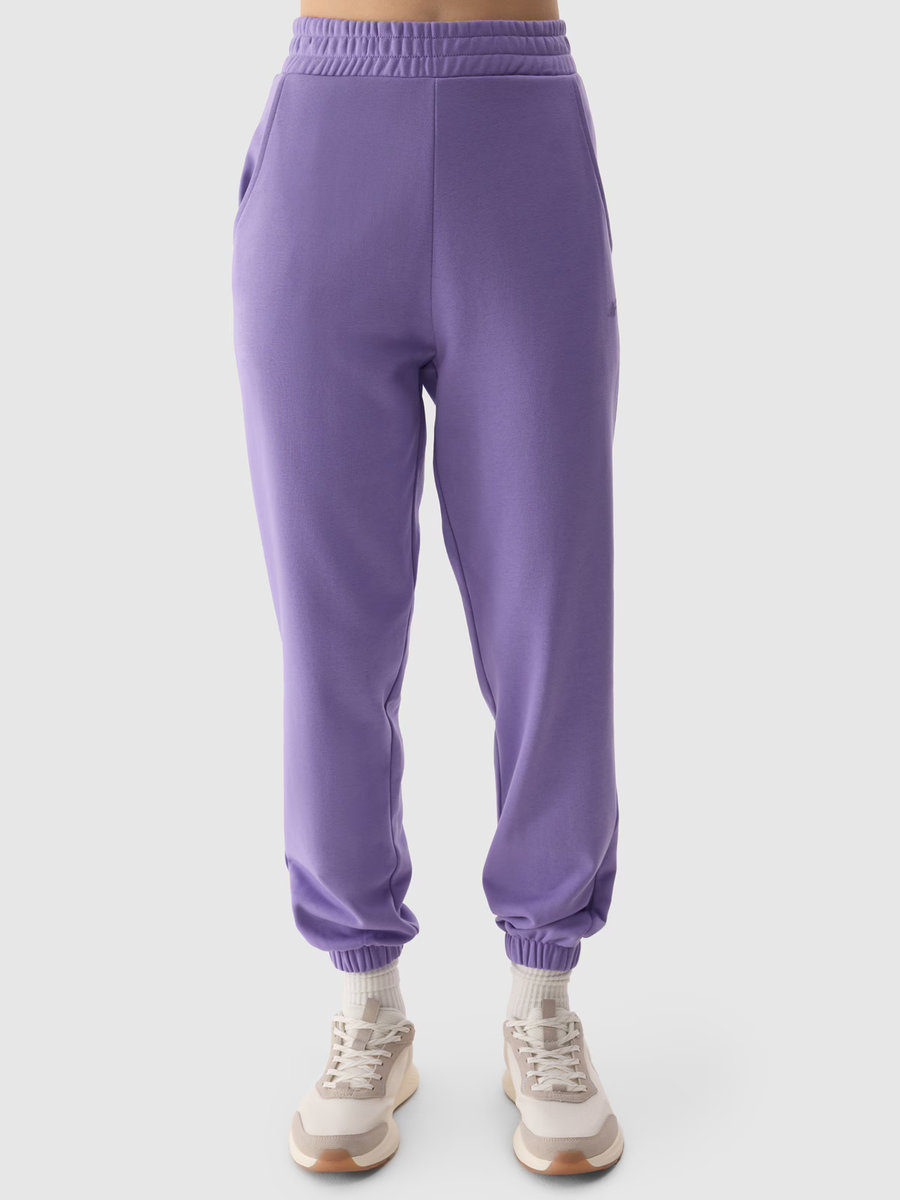 4F Spodnie dresowe joggery damskie 4FRSS24TTROF1054-51S Fioletowy Roz. S