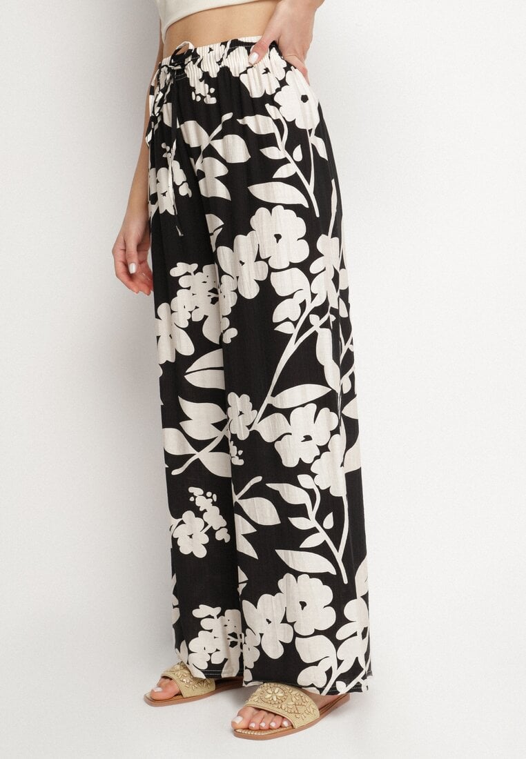 Czarne Wiskozowe Spodnie o Szerokim Kroju z Wysokim Stanem w Kwiaty Neorilia