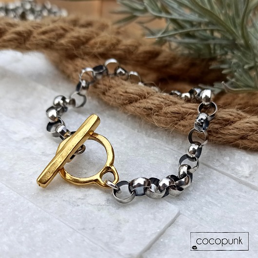 Bransoleta srebro - łańcuchowa ze złotym zapięciem