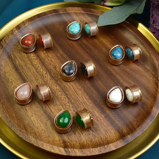 Tunele do uszu 19mm z kamieniami / plugi, rozpychacze, tapery, tunele siodłowe