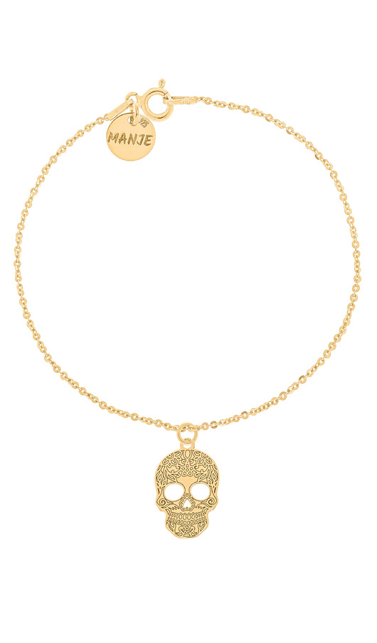 Pozłacana bransoletka z grawerowaną czaszką