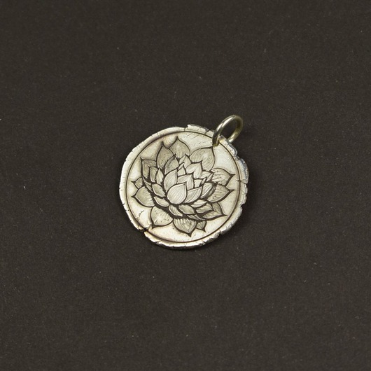 Kwiat lotosu - moneta na szczęście