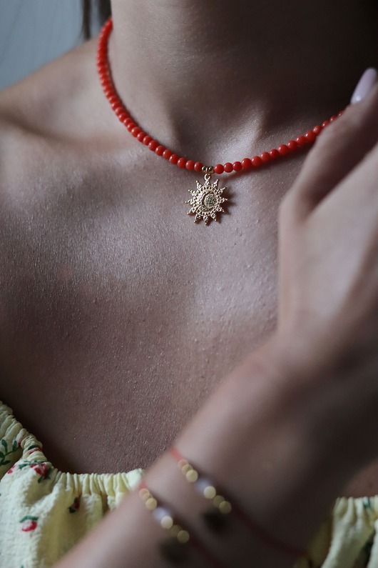 Pomarańczowy Naszyjnik, Naszyjnik Słońce,