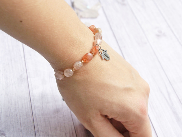 Amulet - kamień słoneczny & hamsa