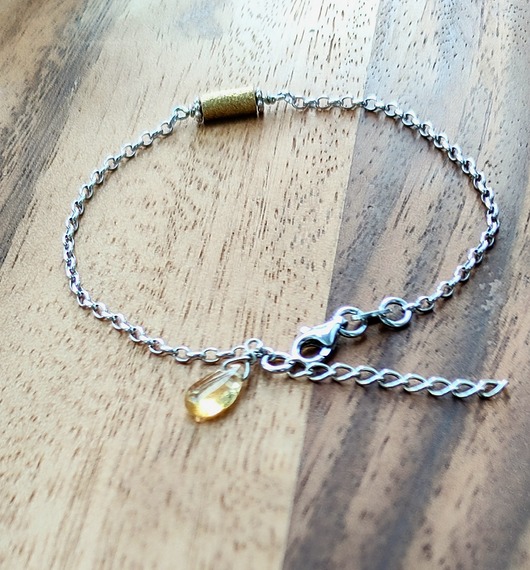 Srebrna rodowana bransoletka z pozłacanym elementem