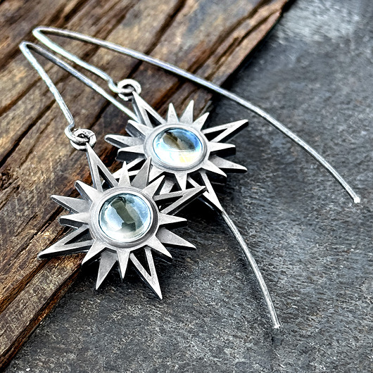 Srebrne kolczyki Gwiazda Wenus z kryształem górskim 8 mm