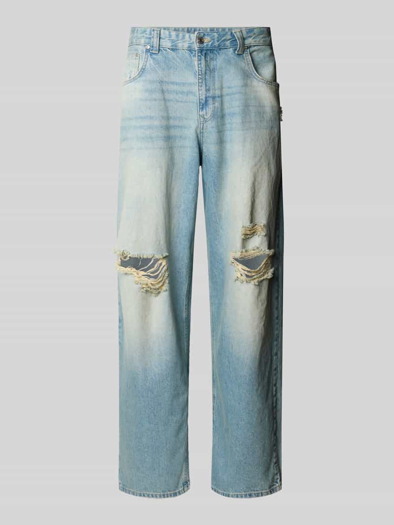 Jeansy o kroju super baggy fit z czystej bawełny z przetarciami