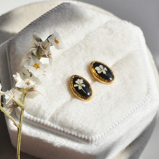 Oryginalne kolczyki z kwiatami dzikiej marchwi