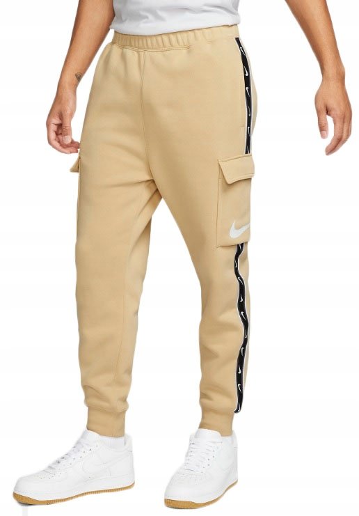 Spodnie dresowe Nike Sportswear Repeat Cargo beżowe DX2030-252 r. L
