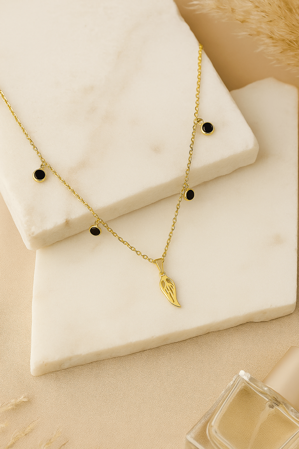 Naszyjnik celebrytka pozłacany z zawieszką skrzydło stal szlachetna 316L