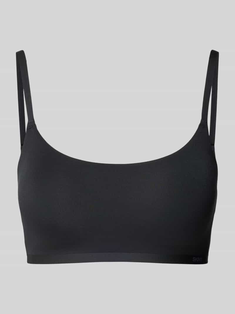 Biustonosz typu bralette z regulowanymi ramiączkami i zapięciem na haftkę