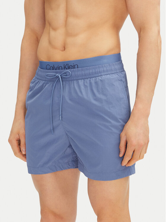 Calvin Klein Swimwear Szorty kąpielowe KM0KM01104 Niebieski Regular Fit