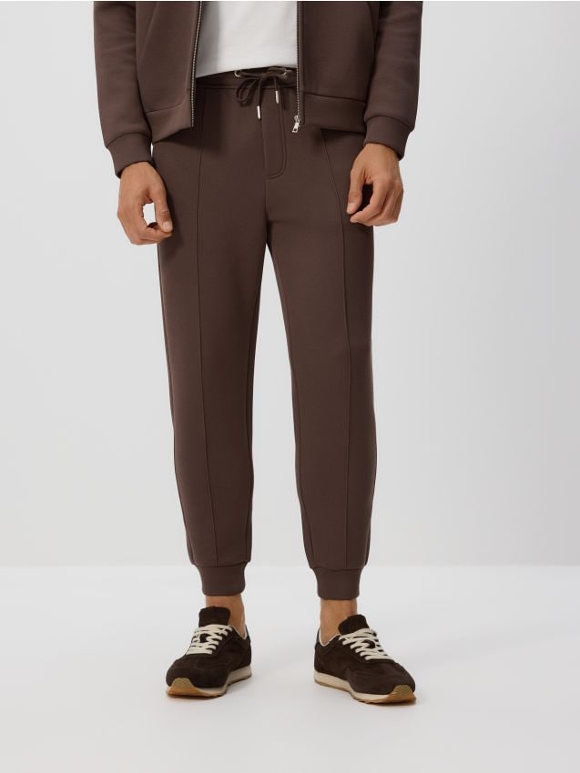 Reserved - Spodnie dresowe slim fit - beżowy