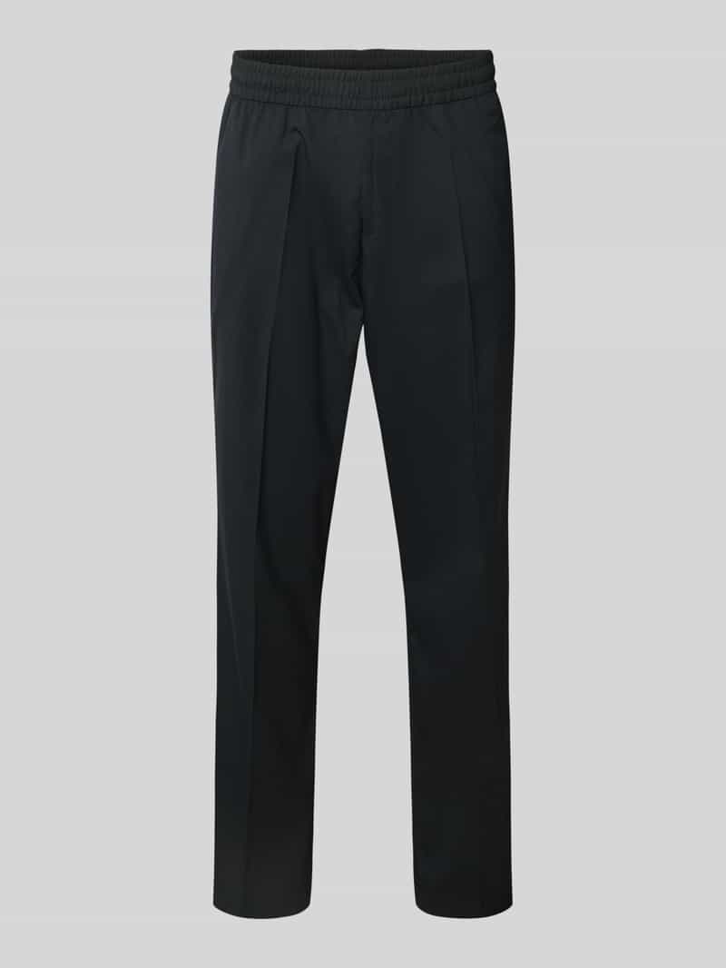 Spodnie sportowe o kroju relaxed fit z elastycznym pasem