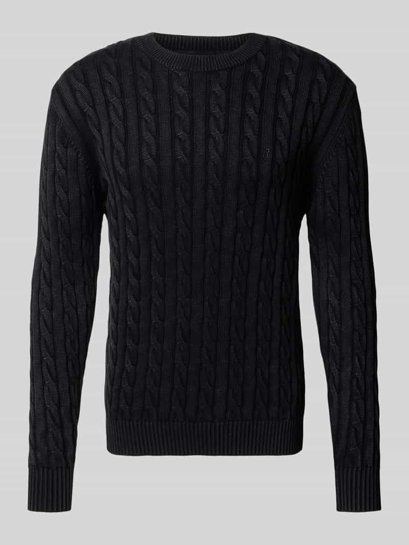 Sweter z dzianiny z wzorem warkocza