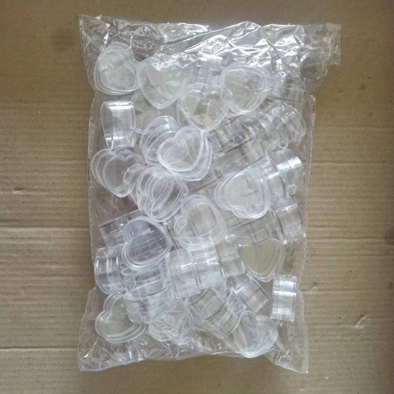 TEMU 50 szt. Słoiki kosmetyczne w kształcie Puste przezroczyste pojemniki kosmetyczne Mini plastikowe pudełka wielokrotnego napełniania z pokrywkami