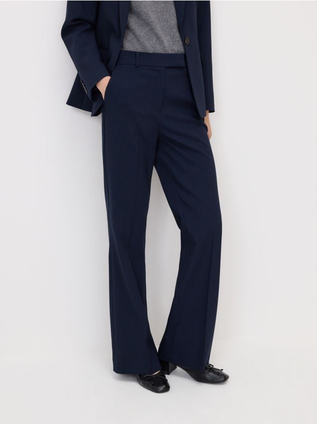 Reserved - Spodnie flare z kantem - granatowy