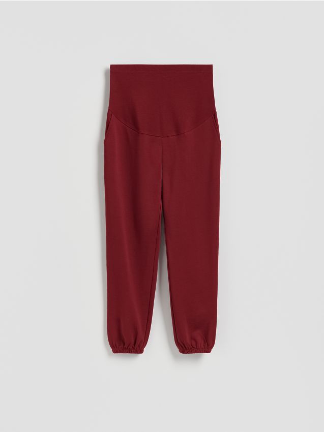 Reserved - Bawełniane spodnie jogger - bordowy