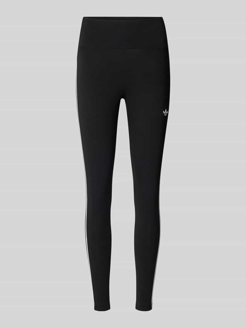 Legginsy o kroju super skinny fit z wyhaftowanym logo