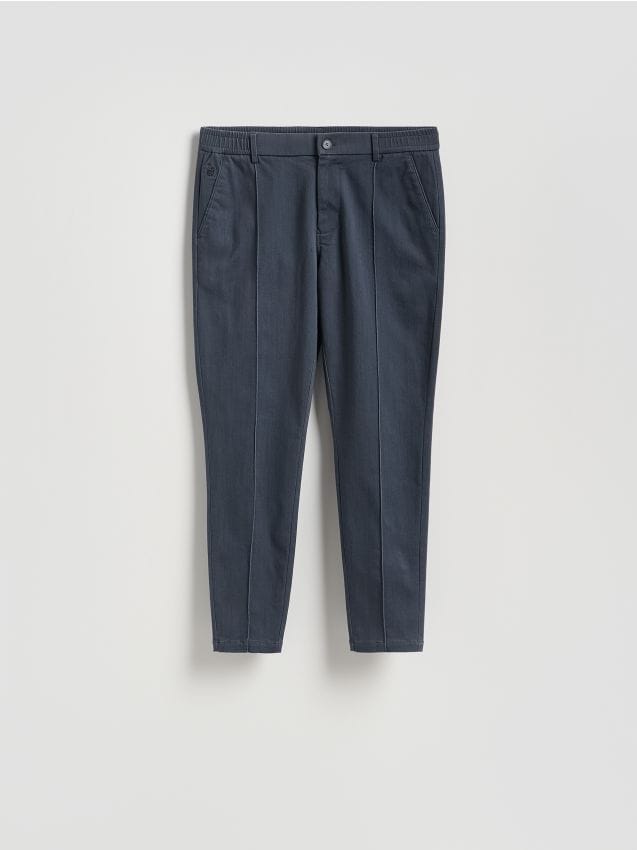 Reserved - Spodnie jogger z zakładkami - granatowy