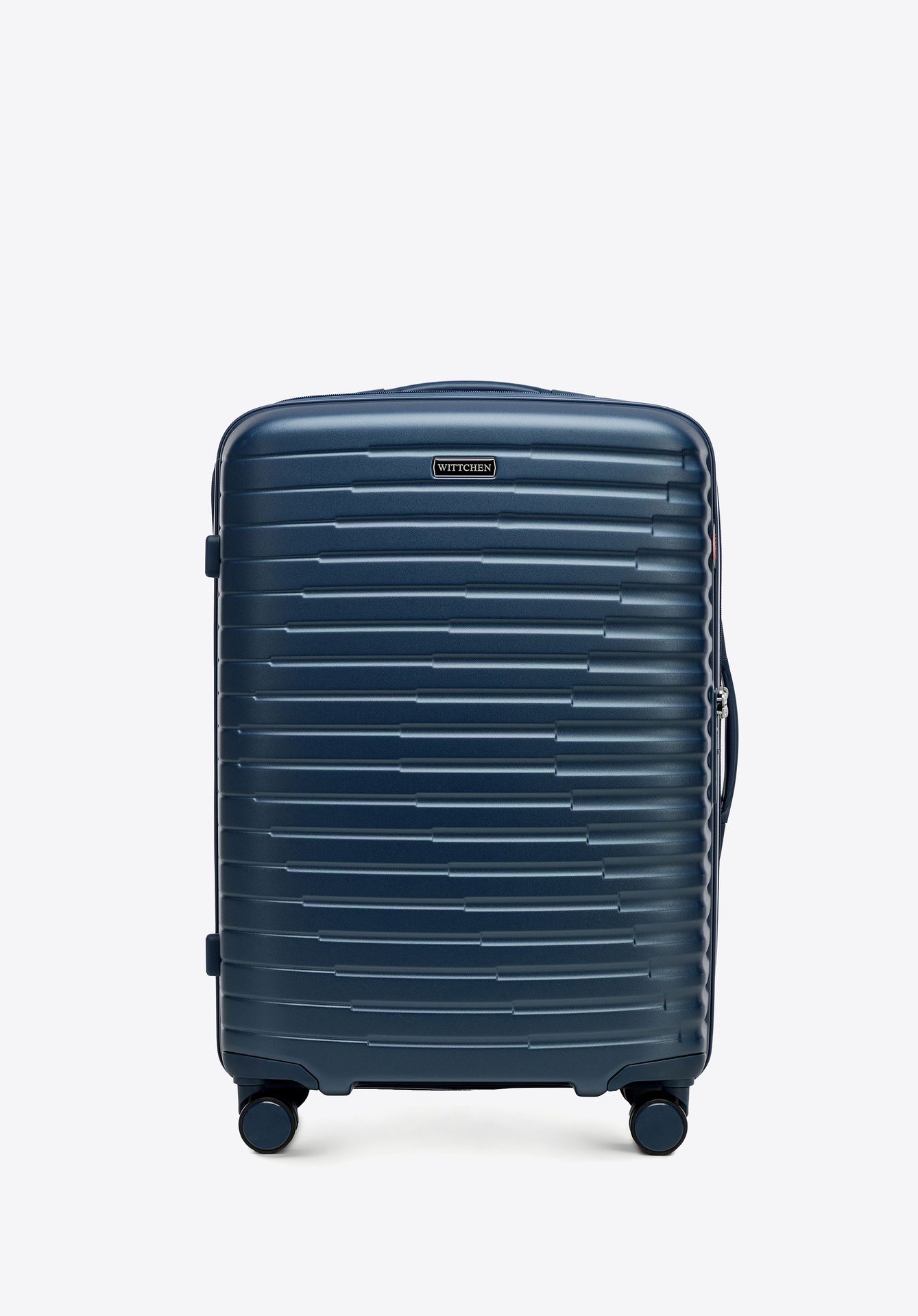 Średnia walizka z polikarbonu w poziome żebrowanie granatowa